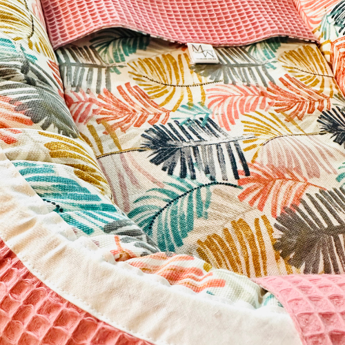 Poppennest | gekleurde veren | Speelgoed